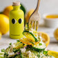 Cucumber salad with feta, mint and lemon olive oil, a forkful lifted above the plate